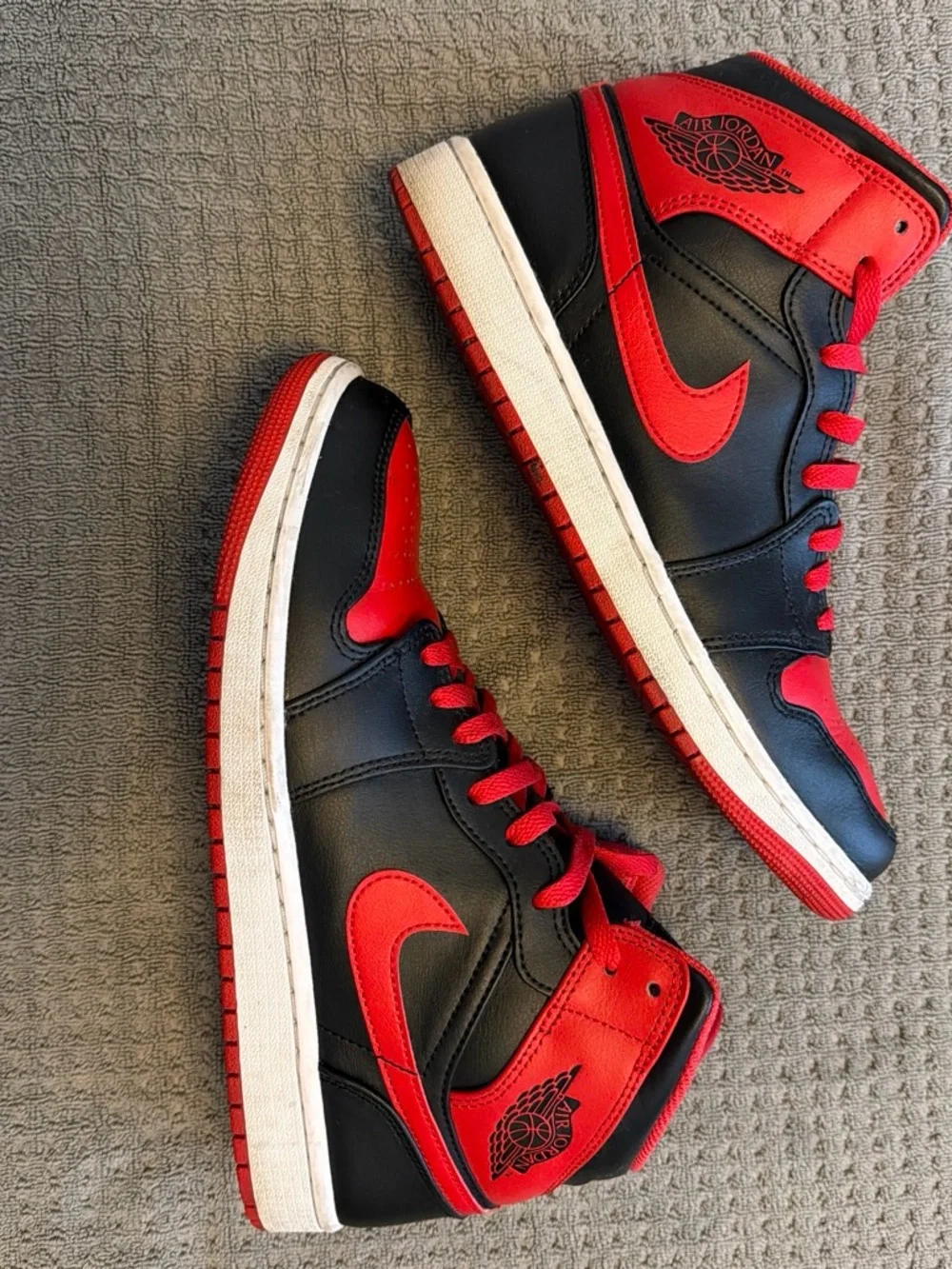 Air Jordan 1 Mid Black and Red High-Top Sneakers